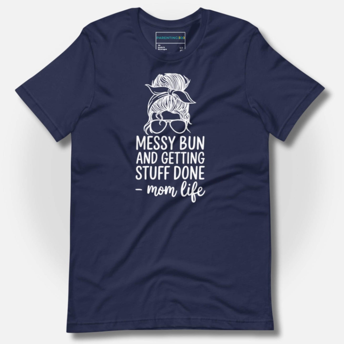 ParentingLOL's navy blue tee with "Messy Bun and Getting Stuff Done - mom life" graphic. Relatable parent humor on a soft, quality t-shirt.