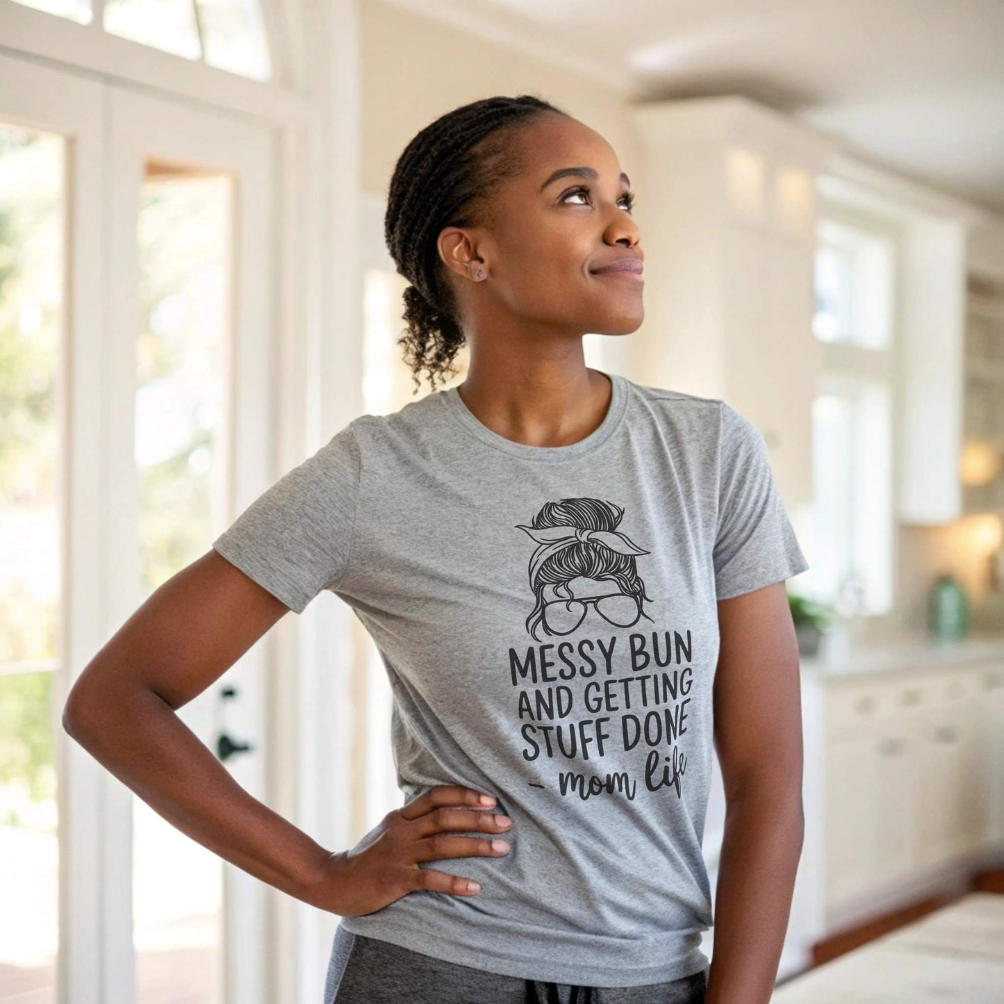 Athletic Heather t-shirt featuring "Messy Bun and Getting Stuff Done - mom life" graphic, ideal for busy moms.