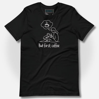 Detail of ParentingLOL's black t-shirt, showcasing the "But first, coffee" design, perfect for a tired, relatable parent needing a laugh.