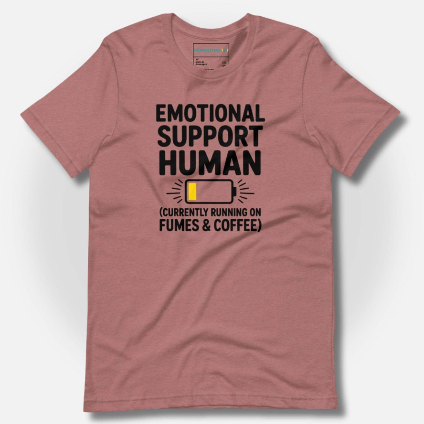 Dusty rose t-shirt with "Emotional Support Human (Currently Running on Fumes & Coffee)" text & low battery icon; humorous parent struggles, mental health awareness, soft comfort wear.