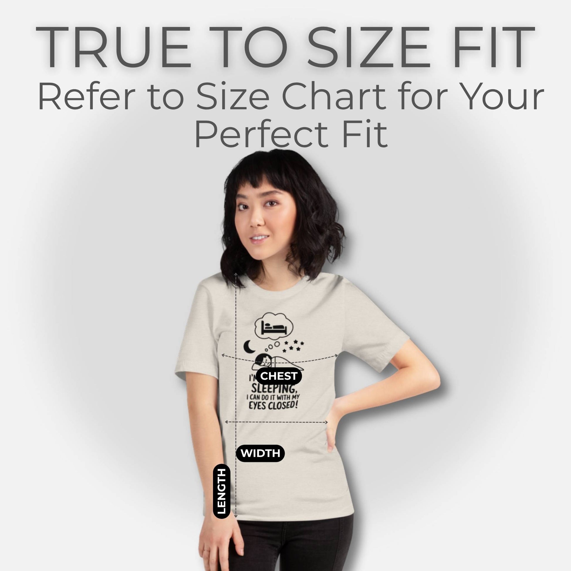 Woman in a heather dust "I'm so good at sleeping" t-shirt, indicating true to size measurements for comfortable parenting humor.