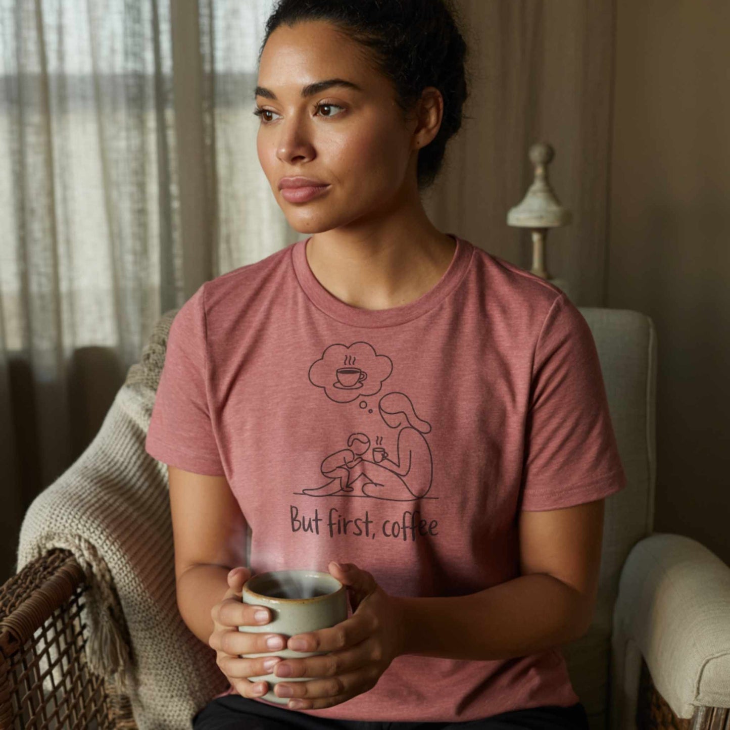 ParentingLOL Hero Shot: Thoughtful mom in a heather mauve "But first, coffee" tee, embracing self-care for parents and mental well-being.
