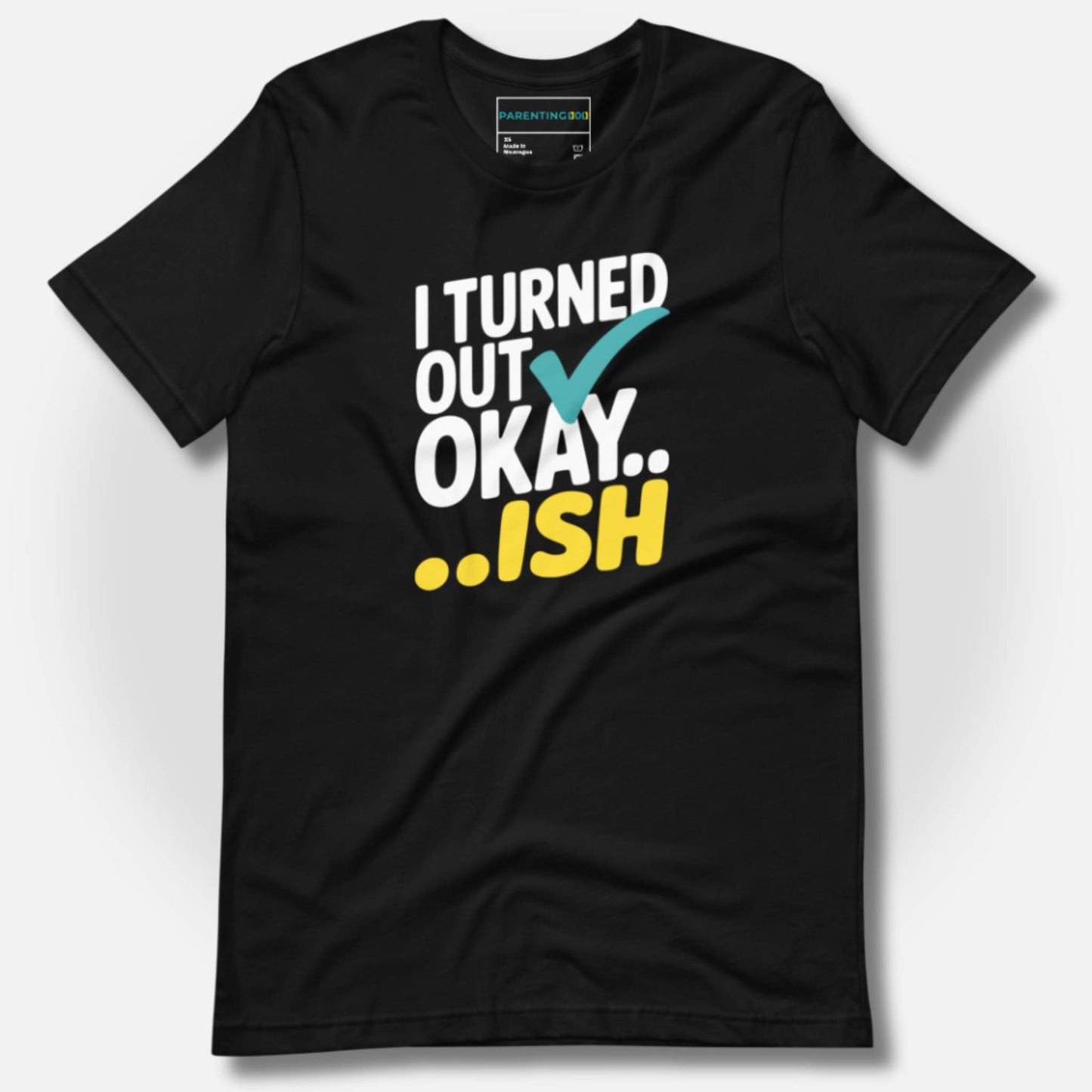 Black t-shirt with "I Turned Out Okay...ish" graphic in white, teal checkmark, and yellow, a funny parent statement.
