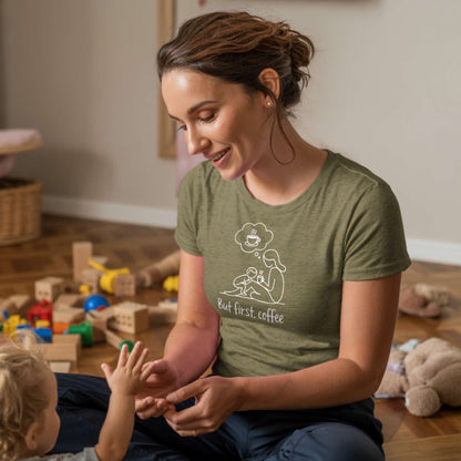 ParentingLOL Lifestyle: Engaging mom in a heather olive "But first, coffee" tee, connecting with her child, reflecting authentic parent realness.