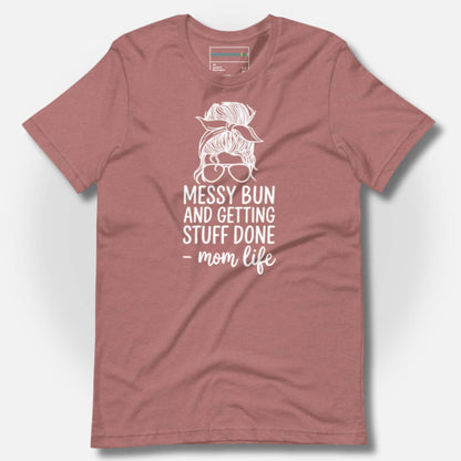ParentingLOL's soft heather mauve tee with "Messy Bun and Getting Stuff Done - mom life" graphic. A comforting, humorous shirt for moms.